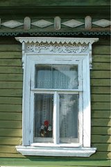 Detail of window of tradionelle house Russian in Russia