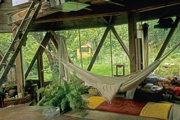 Brazilian hammock in a green house Ariège