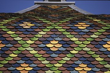 Glazed tiles on a comtois bell-tower Doubs Franc