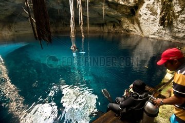 Divers in the Cenote Noh Moson - Yucatan Mexico