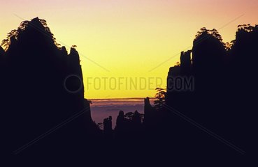 Sunrise in the sacred mountains of Huang Shan China