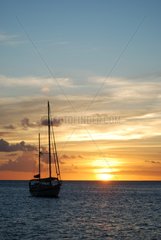 Sailboat in the Bay of Fort-de-France at sunset Martinique