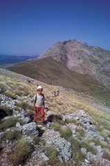 Tourist going towards the top of the Mont Vardousia Greece
