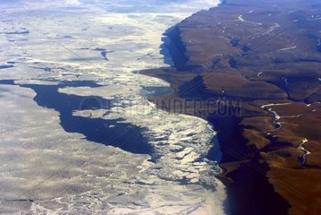 Collapse of ice-floe in july Arctic