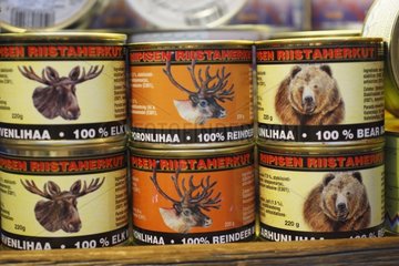 Wild animals meat cans on a market stall Helsinki Finland