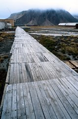 Pavement of boards with Pyramiden Spitzberg Svalbard Norway