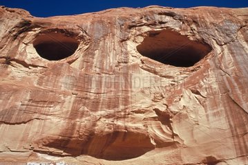 Face engraved by erosion in a cliff Utah USA