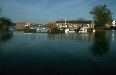 Lock-keepers cottage surrounded by flood water Tewkesbury