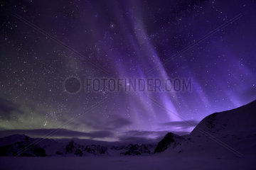 Aurora borealis o on the Kolding Fjord. North East coast of Greenland
