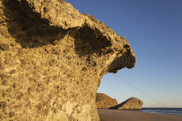 Fossilized lava tongues and walls at the beach Playa del Monsul. Nature Reserve Cabo de Gata-Nijar  Almeria province  Andalusia  Spain.