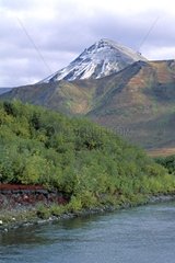 River and snow-covered peak Yukon Canada