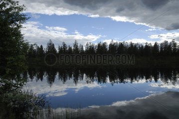 Water clouds and reflection Keramic Norway