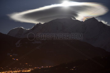 Mont Blanc massif with cap cloud lit by the moon  Saint-Gervais-les-Bains  Haute-Savoie  France  april 1st  2018