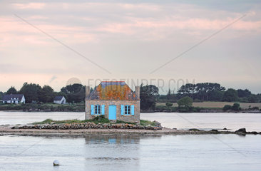Old oyster park guard house at dusk  Ria (estuary) of Etel river  Morbihan  Brittany  France