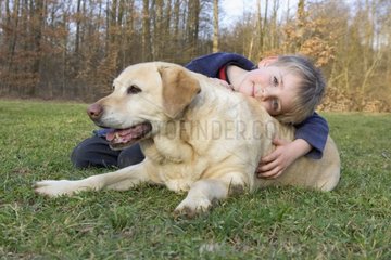 Boy with a dog Labrador France