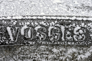 Inscription Vosges frosted in winter  cast iron plate made by the Alsatian Society of Mechanical Engineering Belfort plant 1888  ancestor of the Alstom  orientation table on Ballon d Alsace summit Territoire de Belfort  France