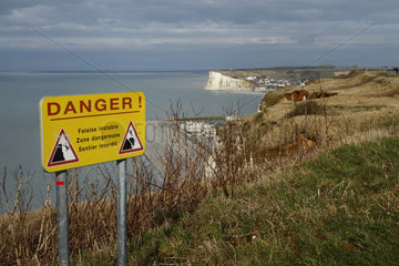Information sign indicating that the cliff is unstable on the heights of Treport  Normandy  France