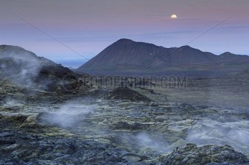 Fumaroles on lava field at night Leirhnjukur Iceland