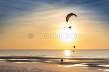 Paramotors in the sky of Wissant  at sunset  Opal Coast  France.