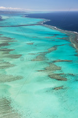 Aerial view on lagoon and reef of the west coast. Lagoon of Poe. West Coastal Area World Heritage Site by Unesco. New Caledonia.