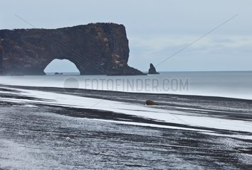 Arch in the cliffs of Dyrhólaey Iceland