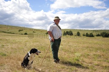 Berger and his Border Collie on the Causse Mejean France