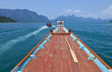 Boat on Cheow Larn lake Kaho Sok NP Thailand