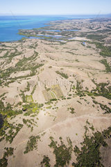 Aerial view on the west coast and the lagoon in the dry season  Poya Commune  New Caledonia.