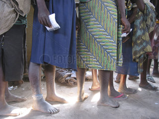 Women wait in line for food distributions at the MSF feeding centre. Feeding centres and other humanitarian aid were organised in Angola after widescale malnutrition during and following the countrys civil war.