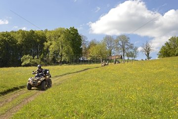 Quad bike on a path in coutryside - France