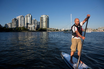 surf paddling in Vancouver bay