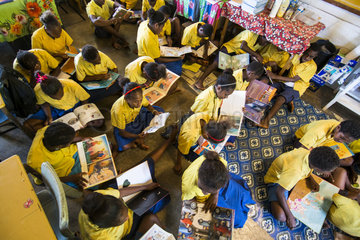 Children reading in a school  Efate Island  Vanuatu
