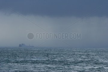 Boat under storm in sea Ile de Ré France