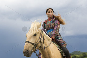 Mongolian woman with her horse  Bashang Grassland  Zhangjiakou  Hebei Province  Inner Mongolia  China