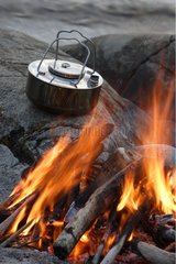 Cooking receptacle near a camp fire of a bivouac Norway