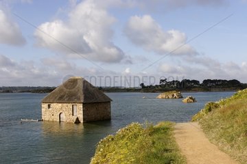 Birlot mill at high tide on the island of Brehat Britain