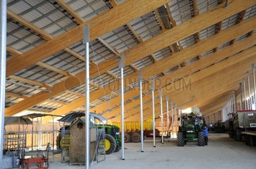 Agricultural machinery in farm covered with solar panels