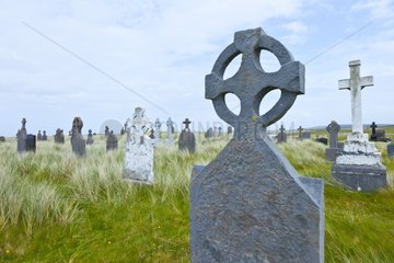 Teachlach Éinne graveyard and church Killeany Village