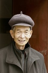 Old man in a village Jianshui Yunan China