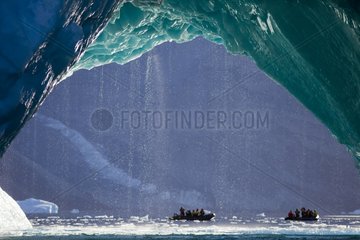 Tourists and iceberg Kejser Franz Joseph Fjord Greenland