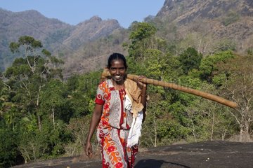 Peasant carrying a tool Thattekad Kerala India