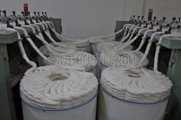 Alpaca wool spinning in crude workshops Coproca Bolivia