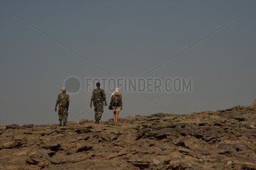 Soldiers escorting a tourist at Crater Dallol Ethiopia