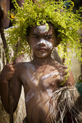 Portrait of young dancer with fern crown  cultural festival. Common Poya. New Caledonia.