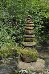 Land Art and Cairn by the stream