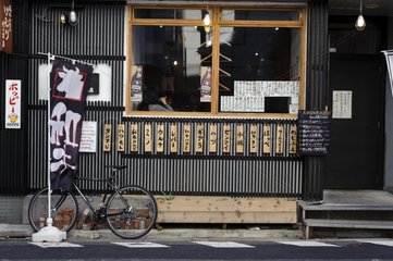 Entrance of a restaurant with menu displayed in Tokyo Japan