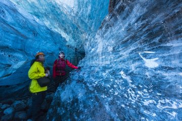 Tourists in an Ice Cave Skaftafell NP - Iceland