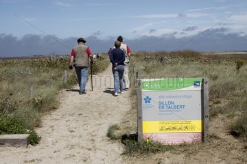 Hikers in the the Sillon de Talbert Nature Reserve France