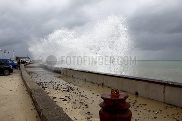 Waves against a sea wall at St. Valery en Caux France