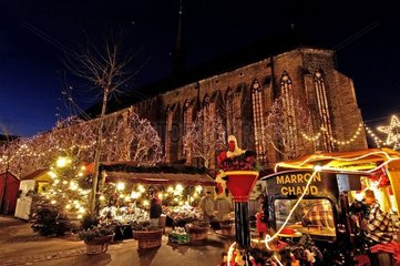 Market of Christmas in front of the church of Dominican Haut-Rhin